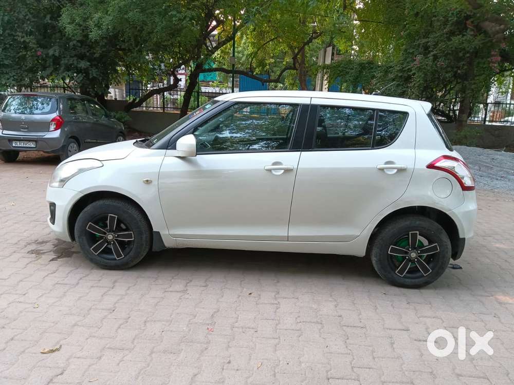 Maruti Suzuki Swift Lxi Optional-o, 2015, Petrol