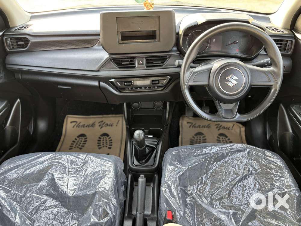 Maruti Suzuki Swift 1.2 Lxi (o), 2024, Petrol