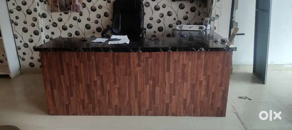 Shop heavy counter and new wooden rake with revolving chair