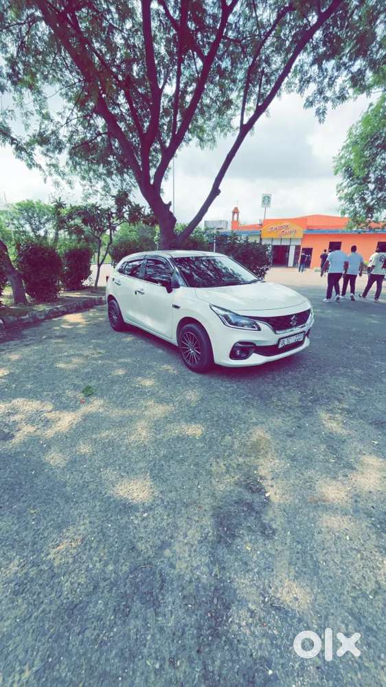 Baleno 2023 Petrol 1st Owner White Alloy Wheels Led Light Music System