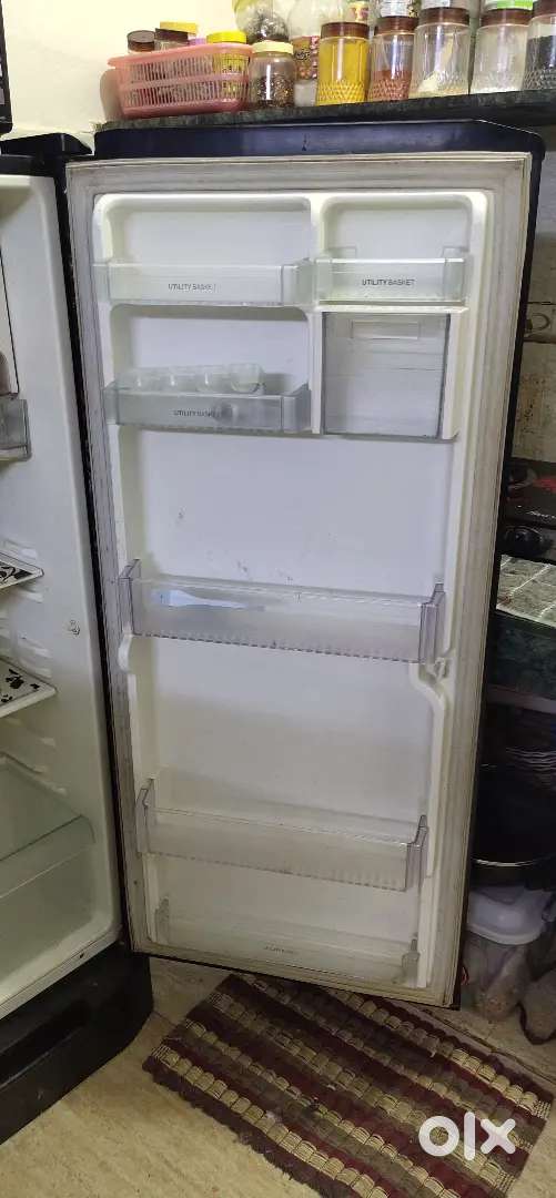 235ltr LG refrigerator black color running condition ok pc