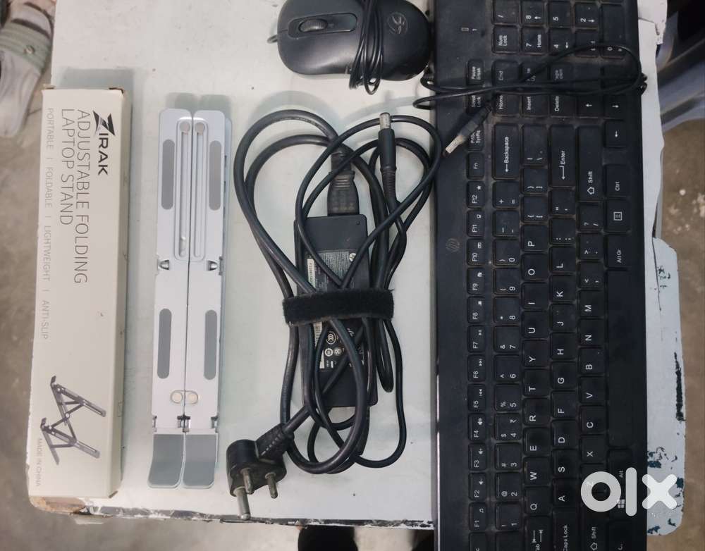 Laptop stand, charger, keyboard mouse