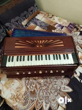 Used harmonium deals near me