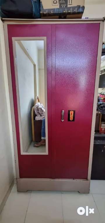 Selling Full Size Metal Cupboard in good condition Size 6.5ft by