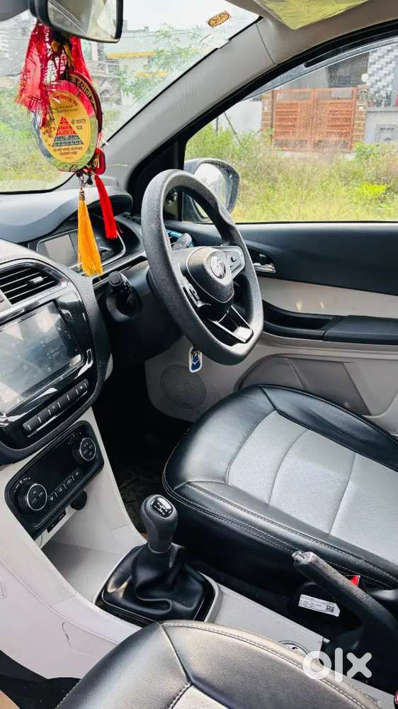 This Is The Top Model Tata Tiago  It's A New Car Driveen Only 9000 Km