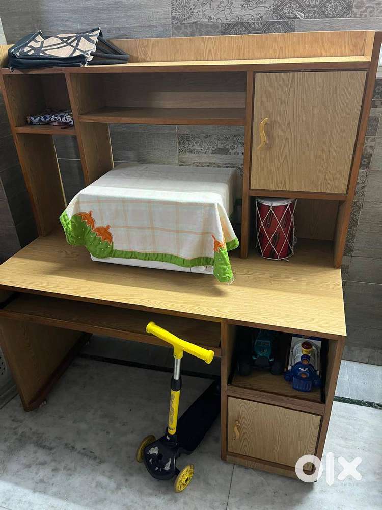 Multipurpose table with keyboard and printer space