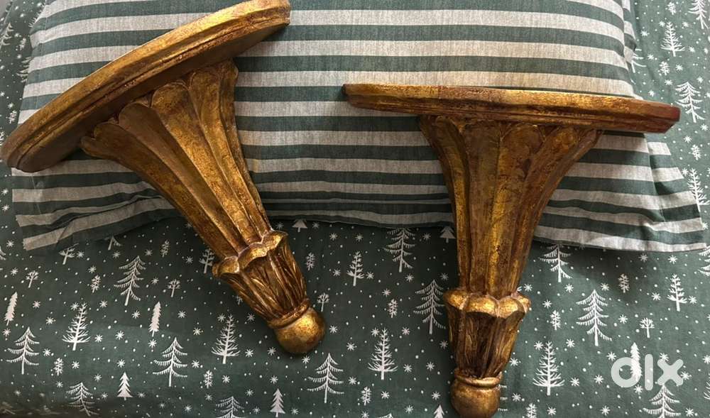Pair of guilded fluted baroque wall shelves