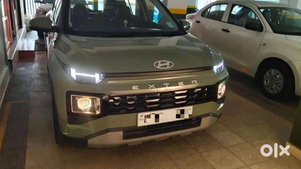 Doctor-driven 2023 Hyundai Exter Automatic  Top Variant  Ranger Khak