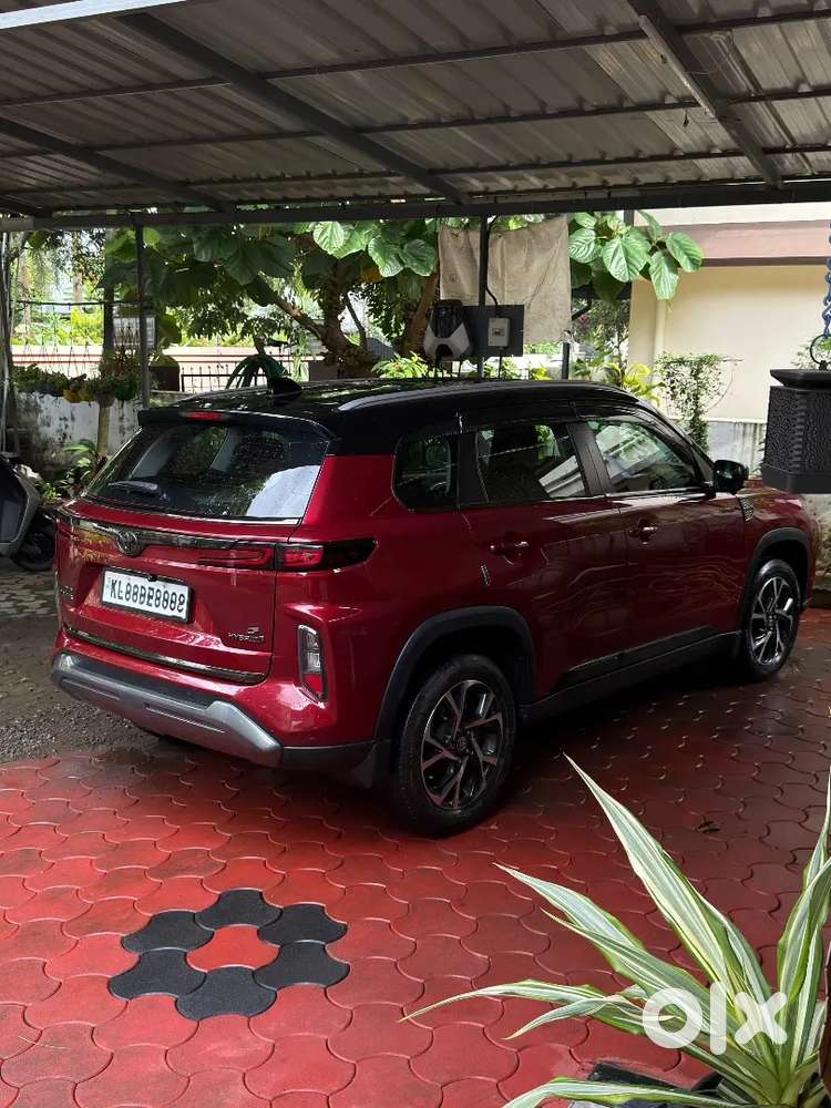 Toyota Hyryder Hybrid G  Fully Hybrid  Dual Tone Red-black  25km/l