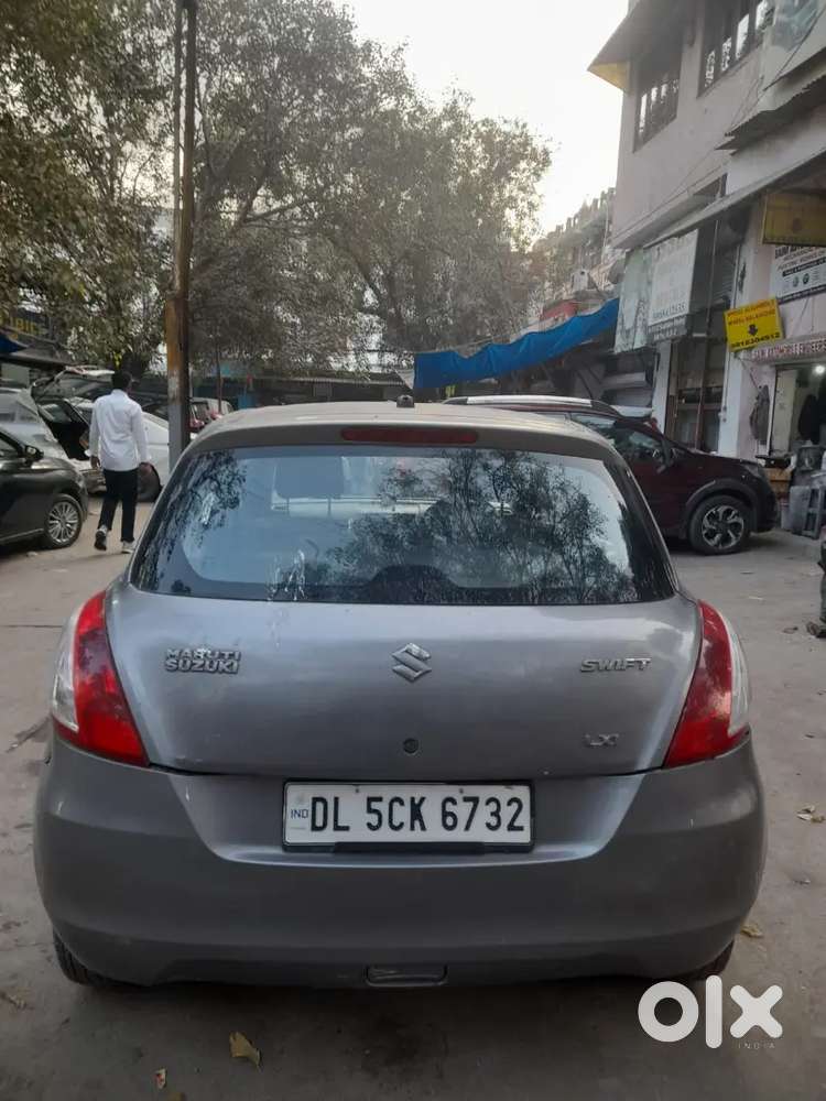 Maruti Suzuki Swift Lxi 2014