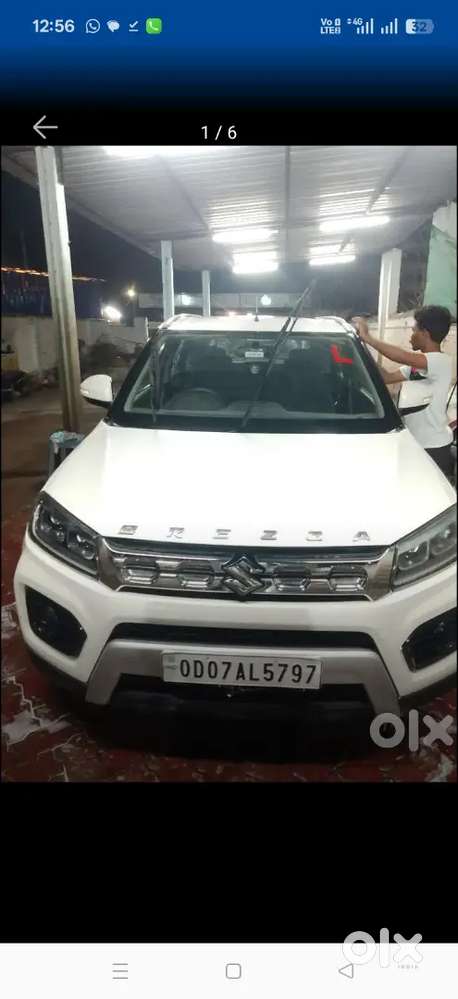 Brezza Zxi Car 18500 Km Driven Only
