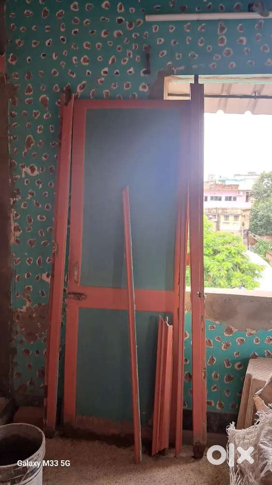 Old wooden door with frame for sale