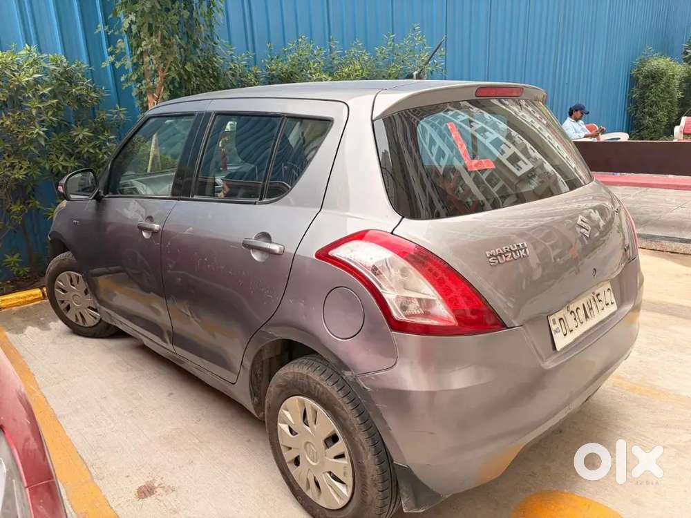 Maruti Suzuki Swift Vxi 2014.