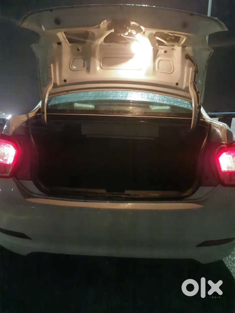 Petrol + Cng.  White Xcent With Complete Document Good Tyre Condition
