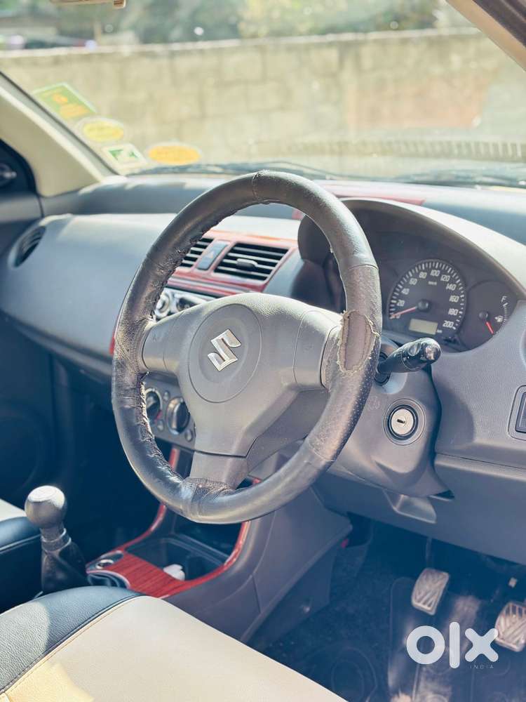 Maruti Suzuki Swift Lxi Optional-o, 2010, Petrol