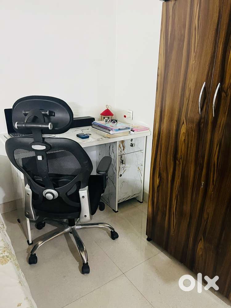 Big Almira with study table and rolling chair