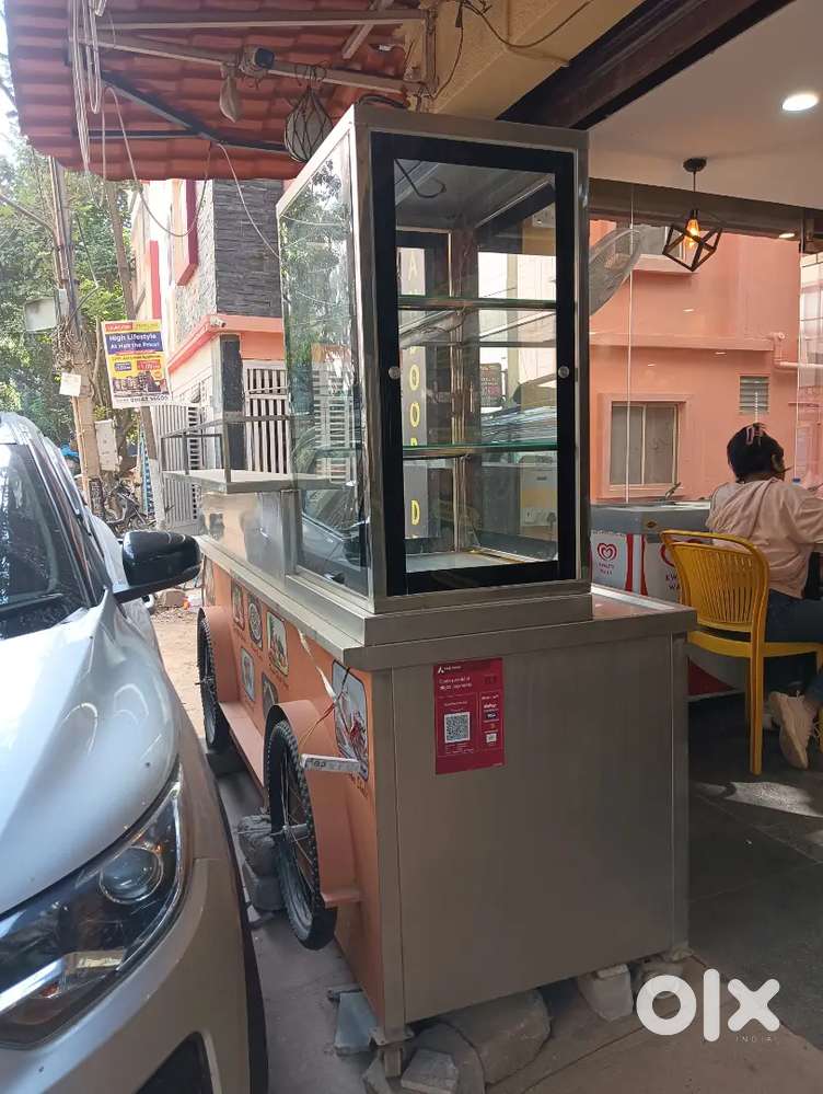 For Sale SS commercial food cart with a glass disply and 2 burners