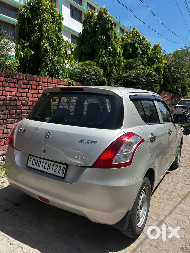 “swift Lxi 2015 – Brand New Feel, Driven With Care!”