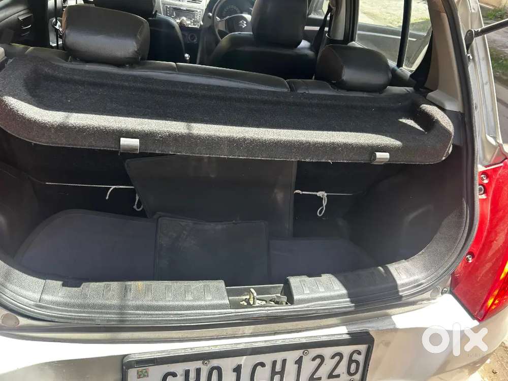 “swift Lxi 2015 – Brand New Feel, Driven With Care!”