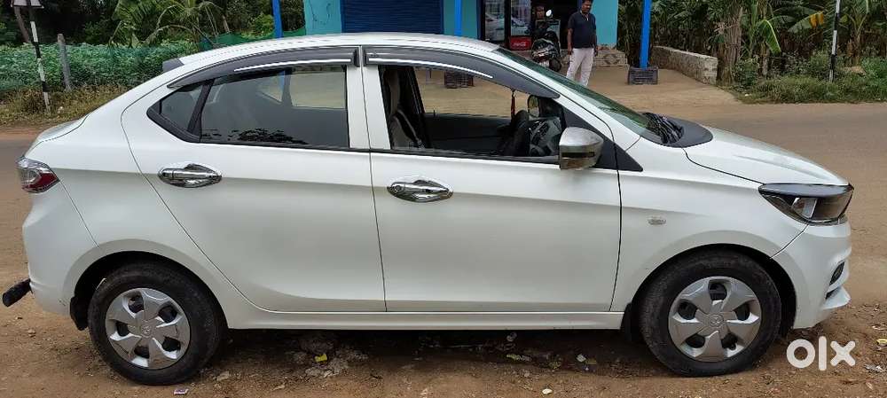 Tata Tigor 5 Petrol 86235 Km Driven