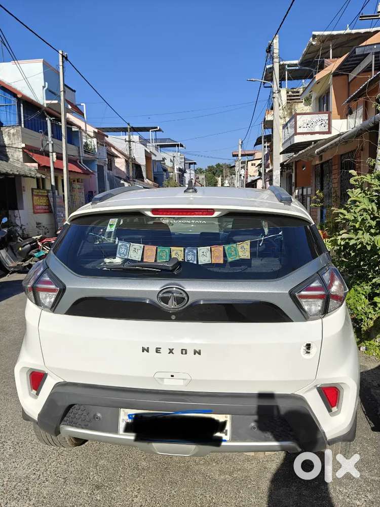 Tata Nexon Xz+s Petrol  | White | 48,000 Km