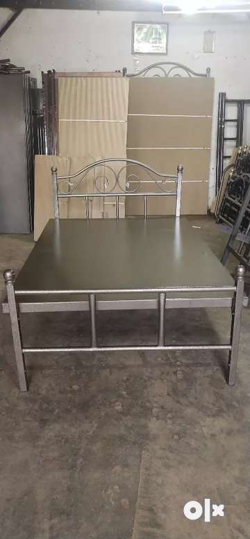 Double iron on sale cot price