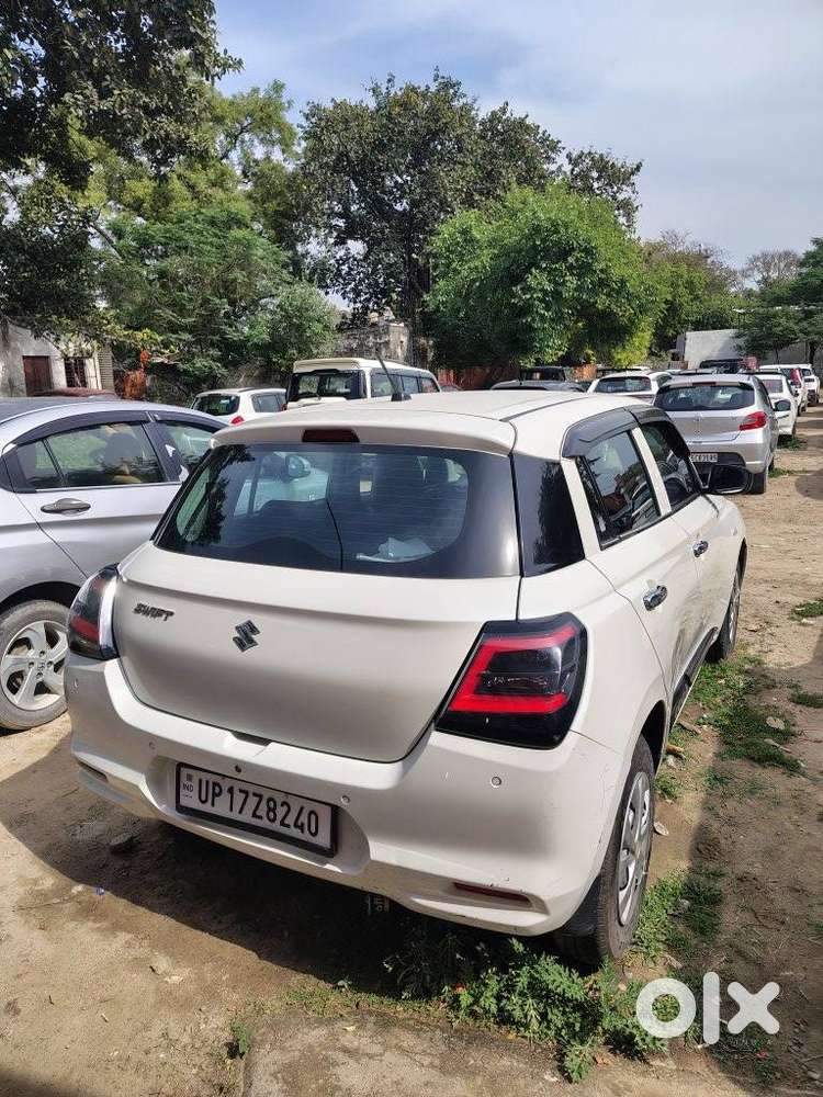 Maruti Suzuki Swift 1.2 Lxi (o), 2024, Petrol