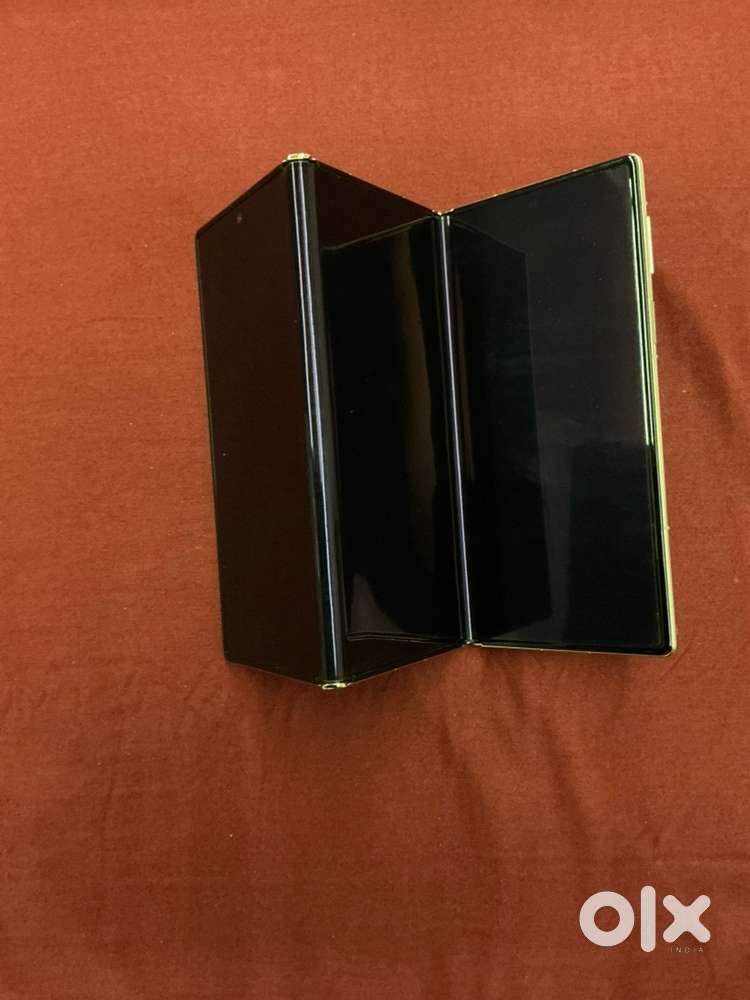 Unique trifold phone in mehroon colour
