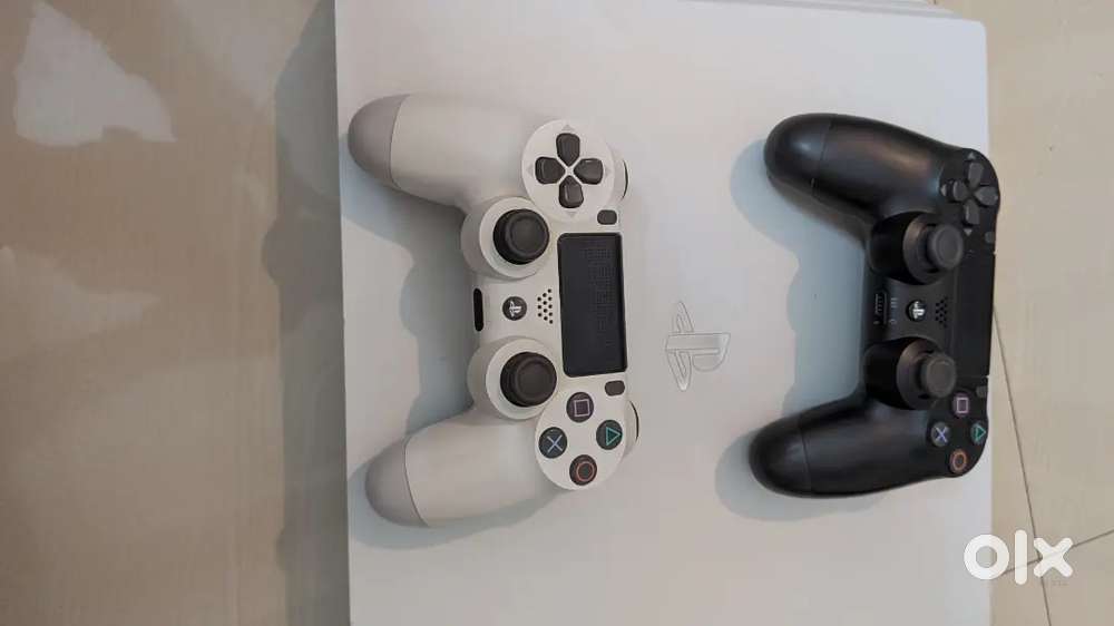 PS4 Pro 1TB – Excellent Condition  2 Controllers