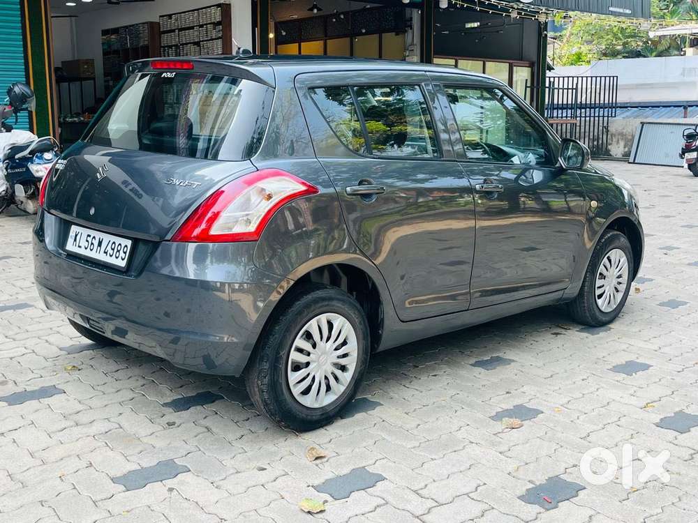 Maruti Suzuki Swift Lxi Optional-o, 2015, Petrol