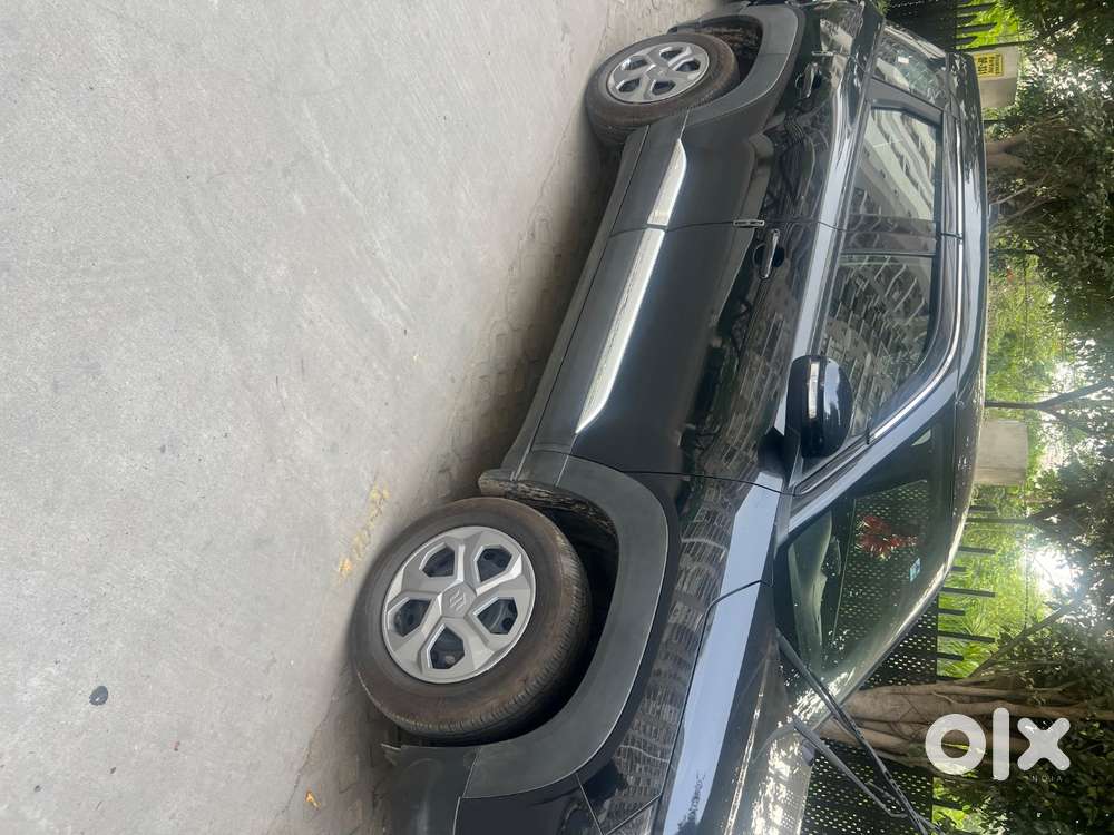 Breeza, October 2025,vxi Hybrid Automatic, Driven 6 Months