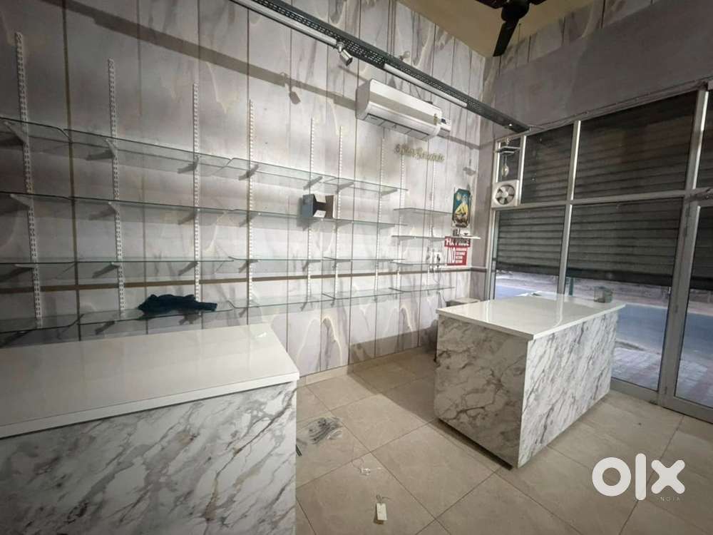 Counter, rack, AC, chair for sake