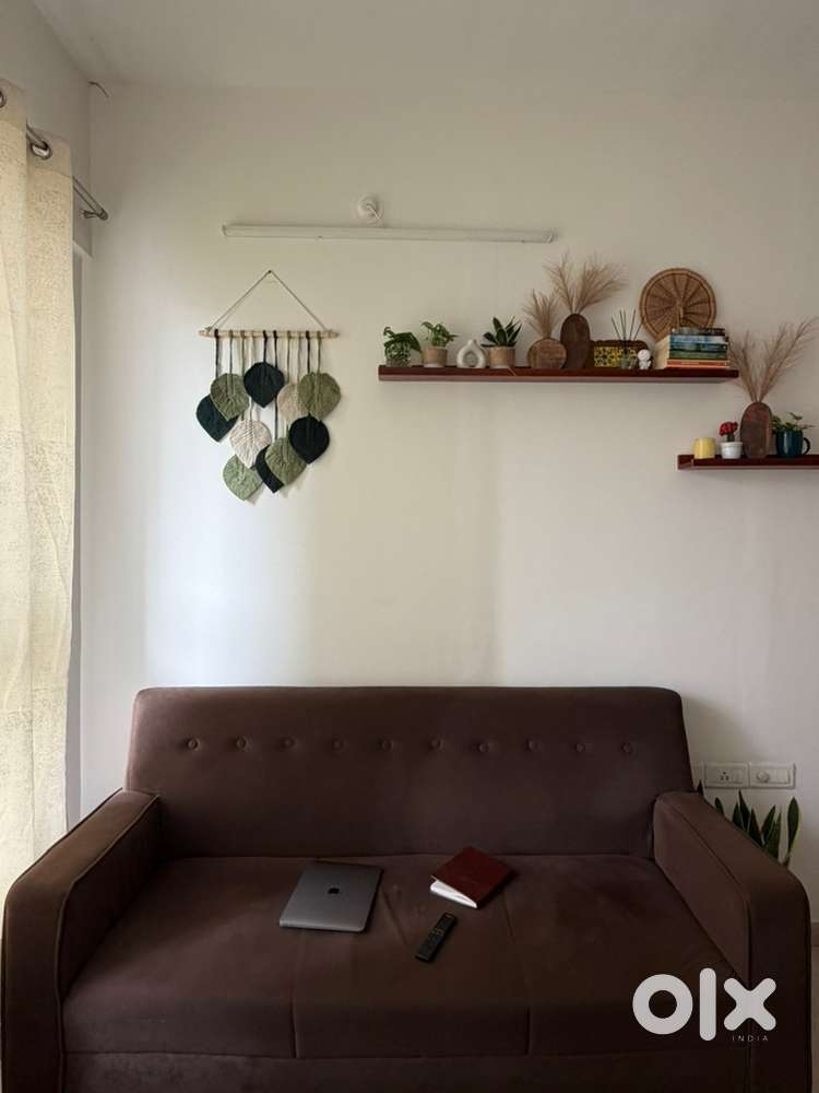 3 seater brown sofa