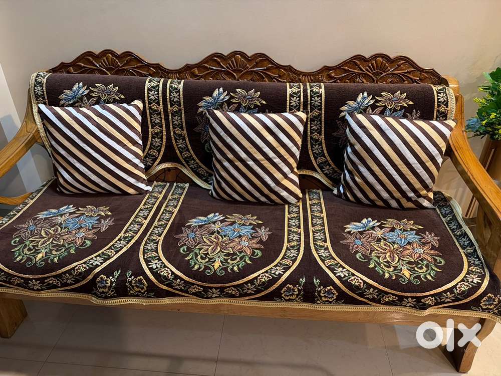 5 seater sofa with glass table.