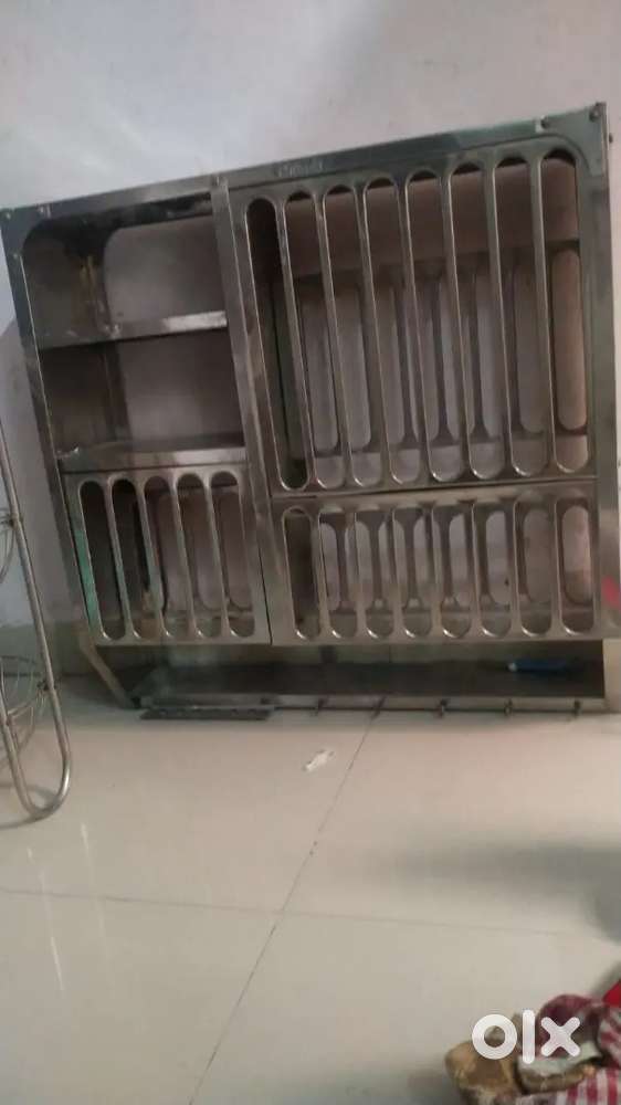 a stainless steel kitchen wall-mount dish and utensil