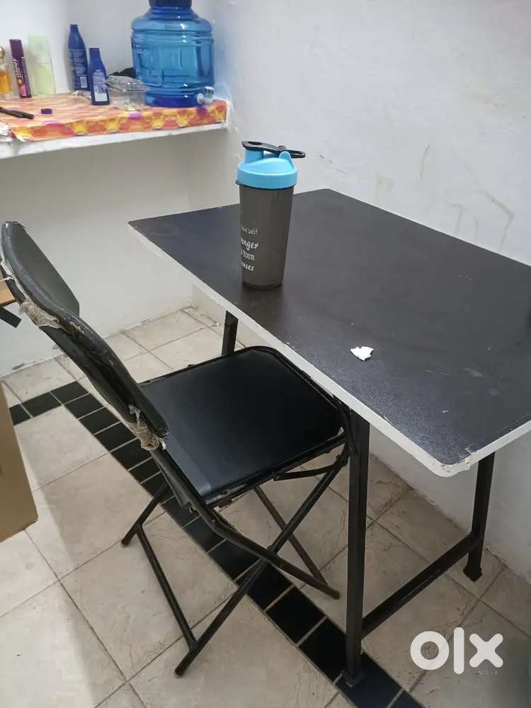 One Cooler , One foldable bed , one set of chair and table