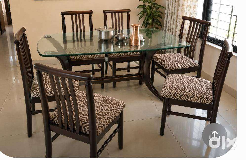 Wooden dining Table 5' x 3' glass top and 6 chairs