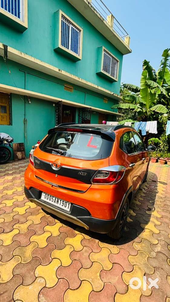 Tata Tiago Nrg Manual Petrol &ndash; Orange Colour &ndash; 66,647 Km Driven