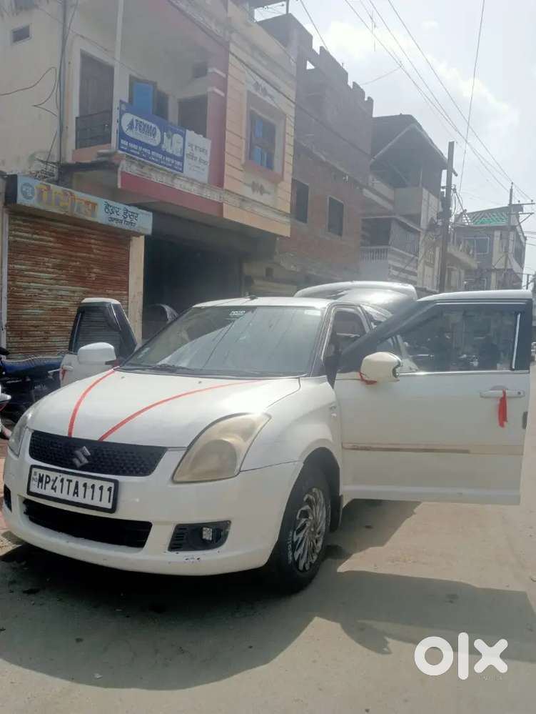 Maruti Suzuki Swift Lxi 2010