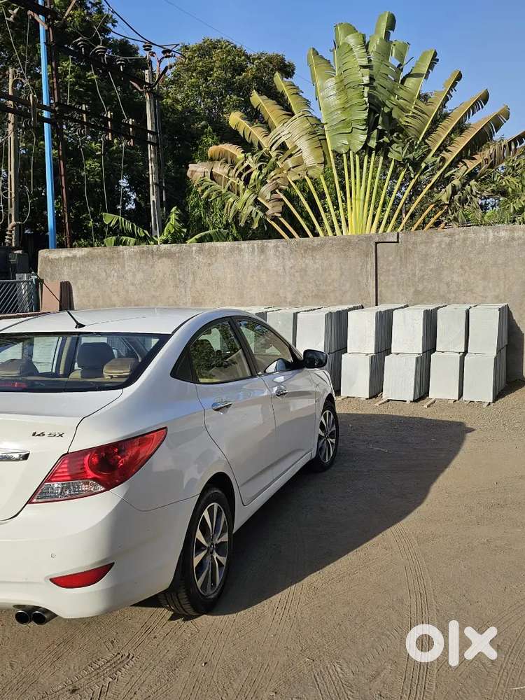 Verna Auto Top Genuine Dr. Car