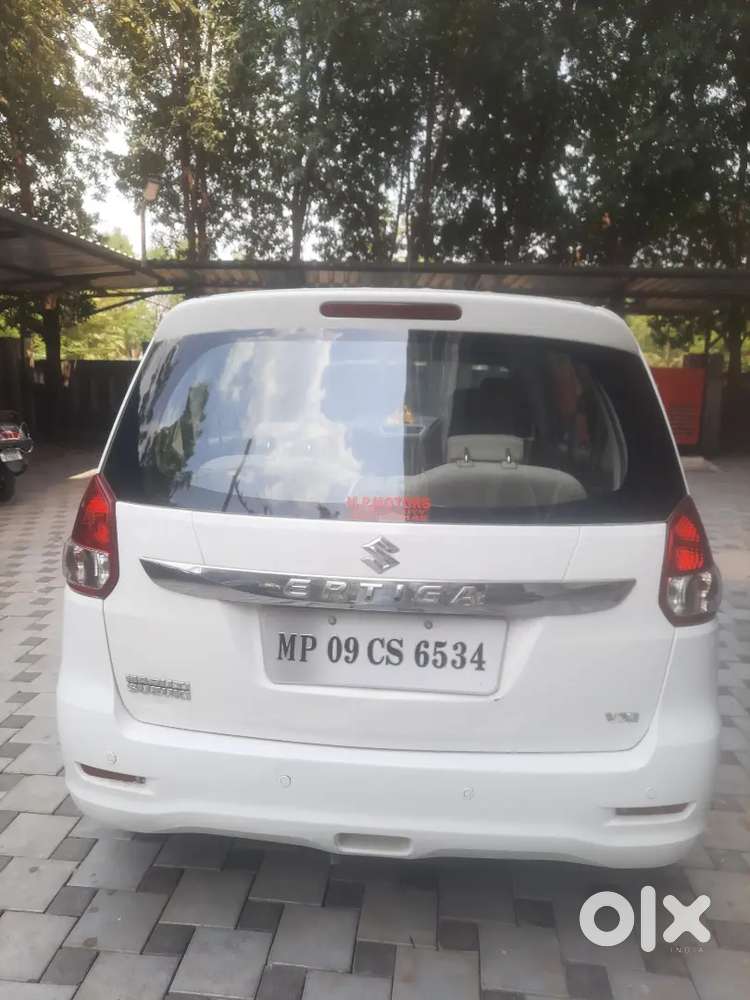 White Ertiga, Brand New Spare Tire, Only 1 Year Old Battery.