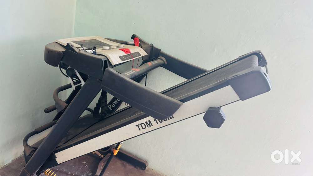 Trademill with front side broken but working condition