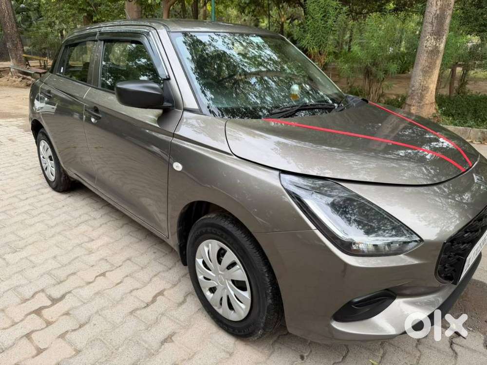 Maruti Suzuki Swift 1.2 Lxi (o), 2024, Petrol
