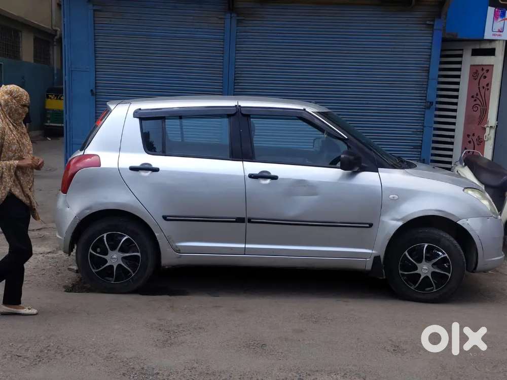 Swift Vxi 2006 Km Driven