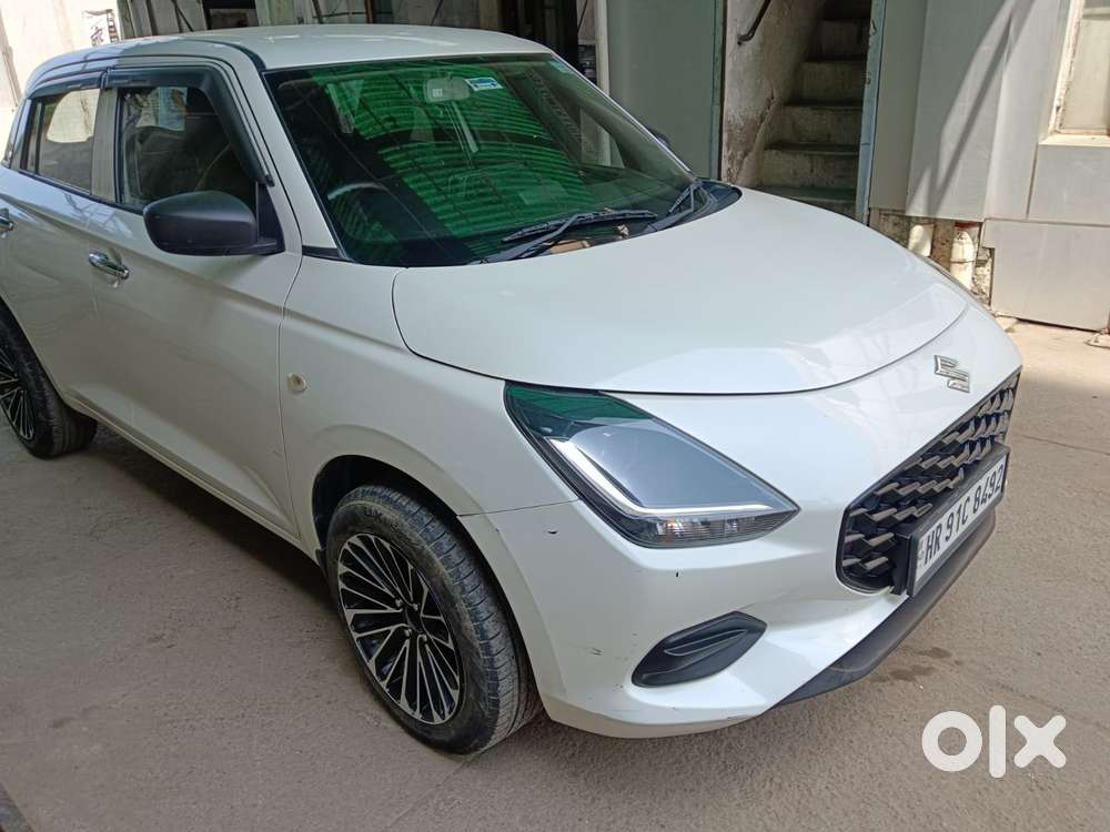 Maruti Suzuki Swift Lxi Optional-o, 2024, Petrol