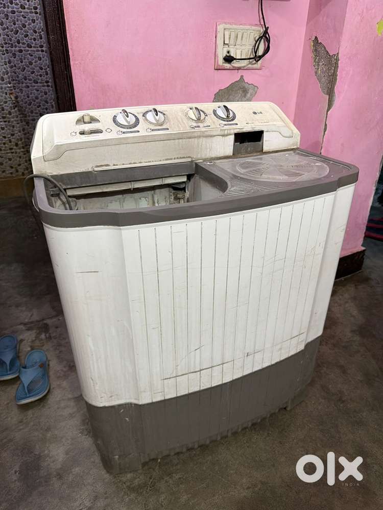 LG 7.5 KG sub washing machine with white and grey colour