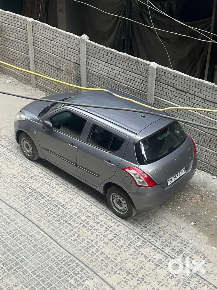 Maruti Suzuki Swift Lxi 2014