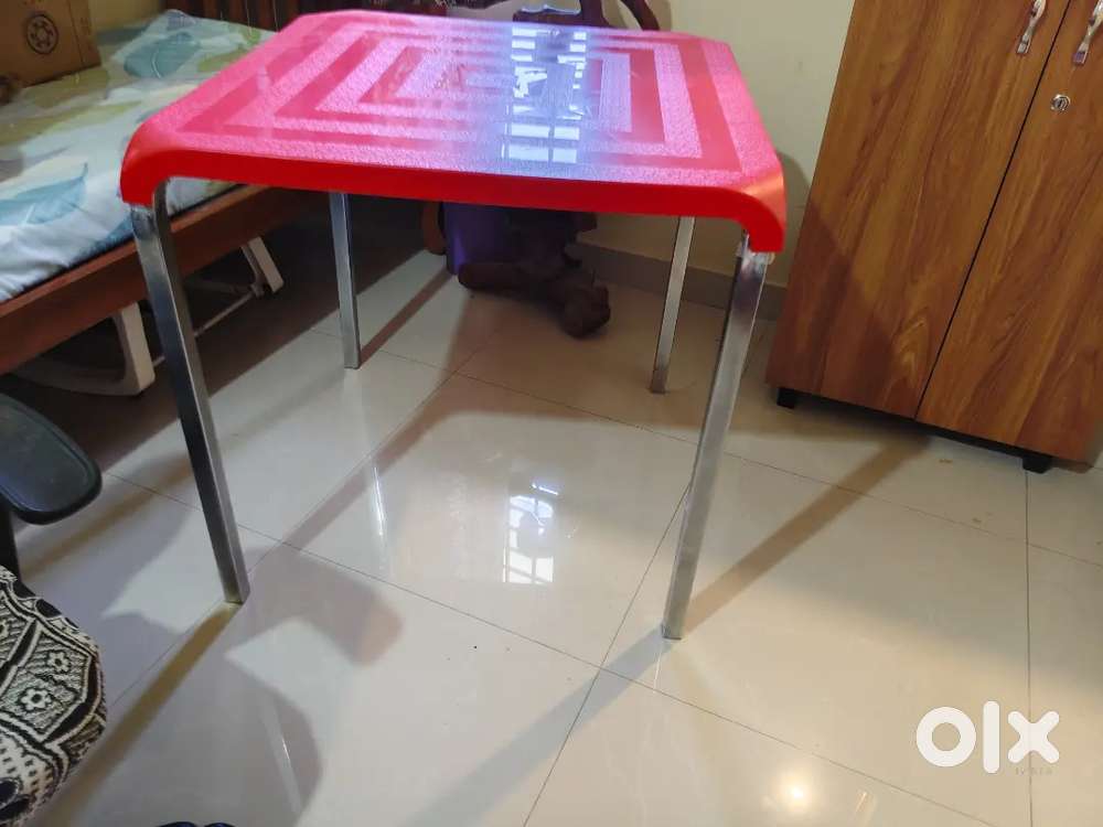 Steel Table with Plastic Top. New like condition