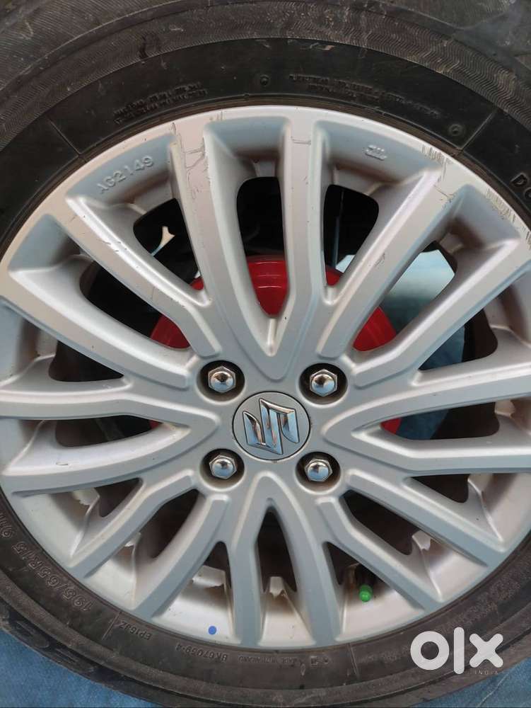 Dzire Zxi With Star Stop Button And Alloy Wheels And Keyless Entry