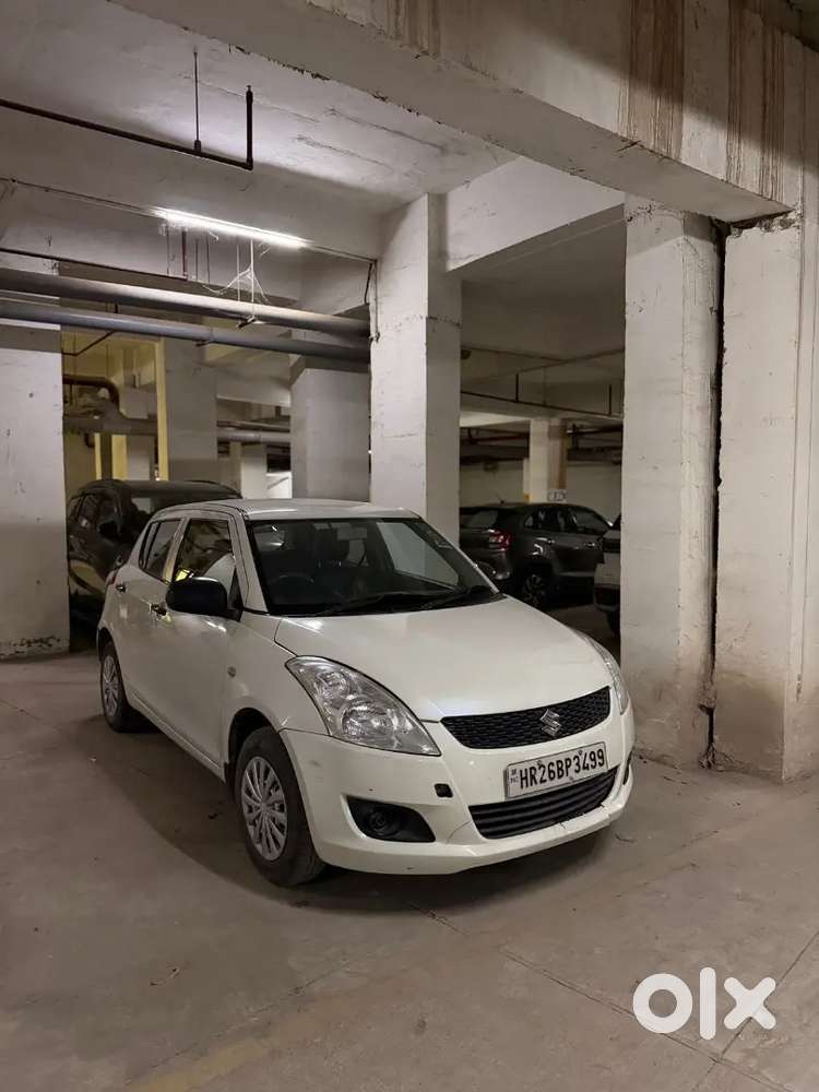 White Swift Single Hand 121500 Kms Petrol
